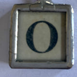 O - initial charm